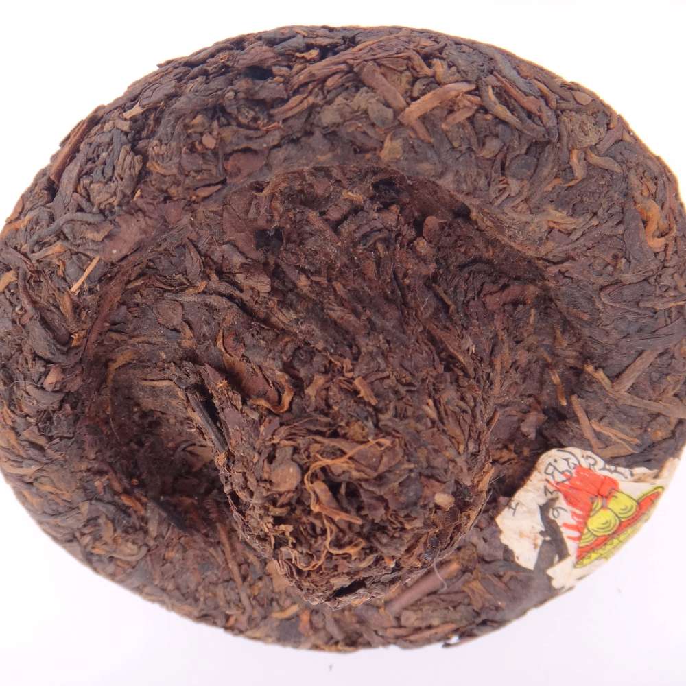 Thé Pu'er Compressé Champignon Jincha Xiaguan 1998 - vue de dessous